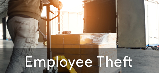 workers using hand pallet jack unloading package boxes into carg