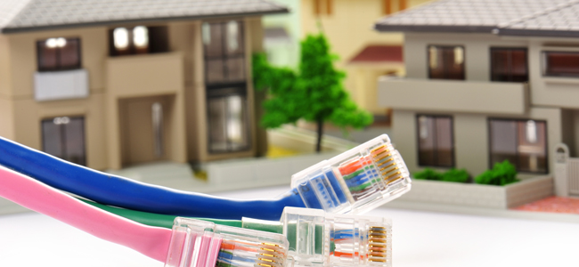 住宅と電話回線のイメージ